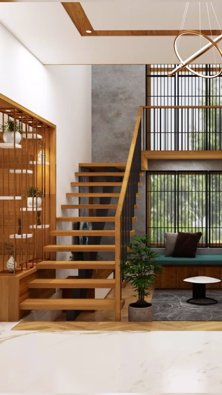 Home Stairs Design: 12 Ideas from Glass Treads to Built-In Storage 12 Modern wooden open-tread staircase with black metal railings next to a built-in wooden shelf unit.